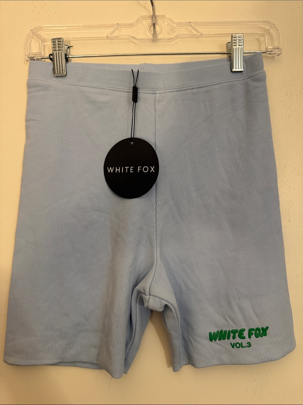 White Fox Boutique Men’s Pale Blue Ribbed Athletic Shorts with Green Logo